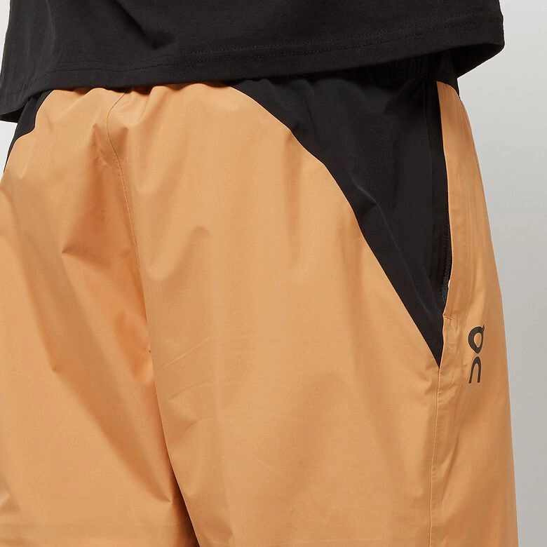 On Storm Pants logo
