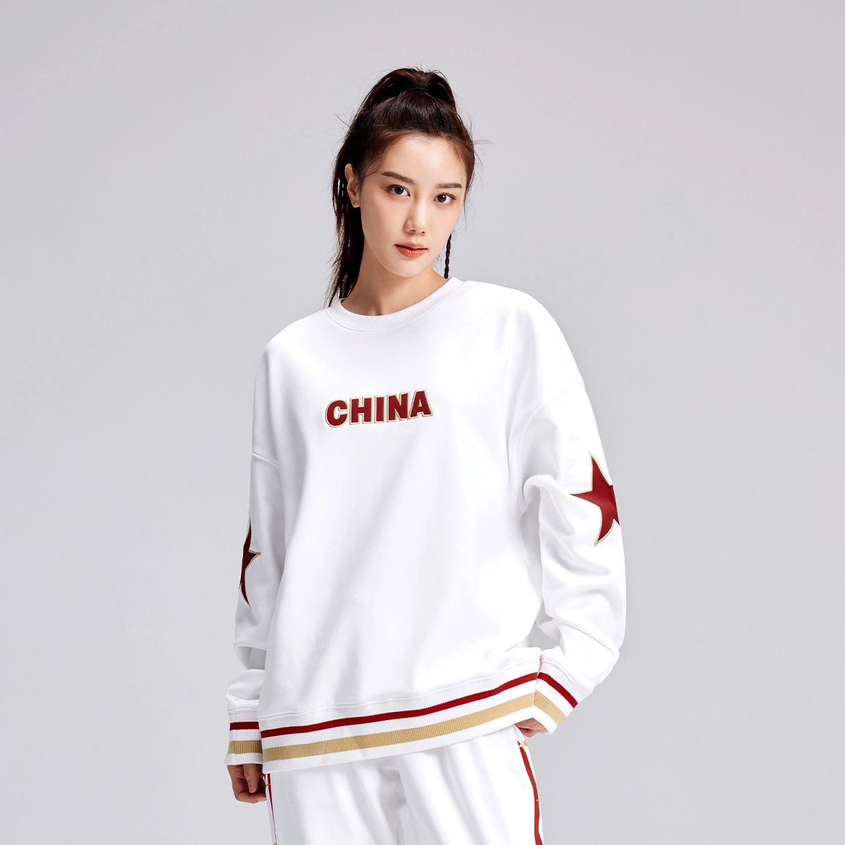 鸿星尔克 鸿耀中国 中国字母星星印花休闲运动圆领套头长袖卫衣 男女同款 正白