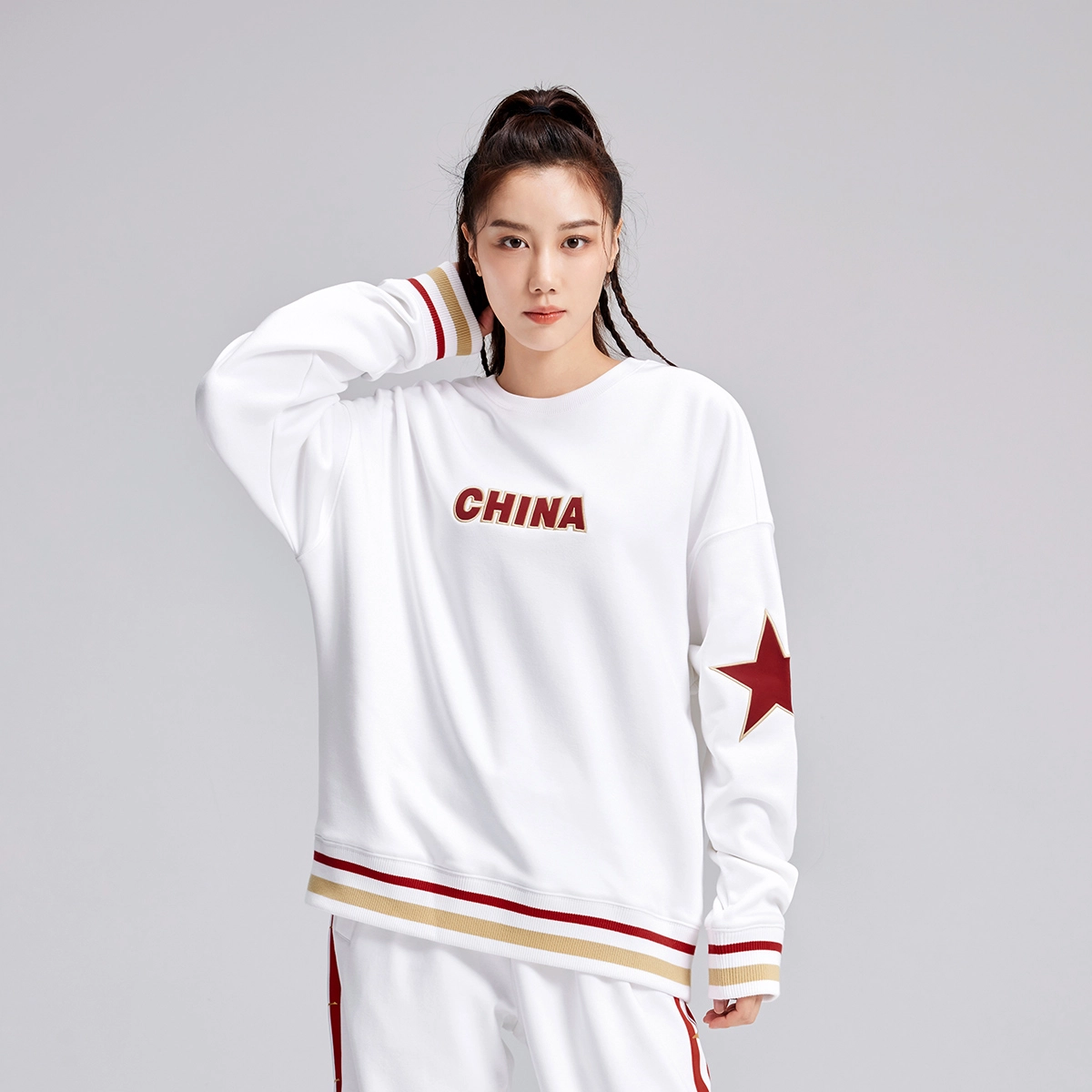 鸿星尔克 鸿耀中国 中国字母星星印花休闲运动圆领套头长袖卫衣 男女同款 正白
