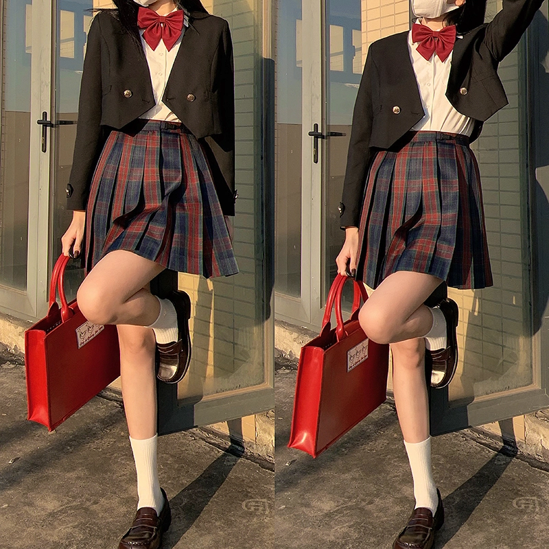 东鲸岁时记 经典学院风格纹百褶短款半身裙 圣诞红格