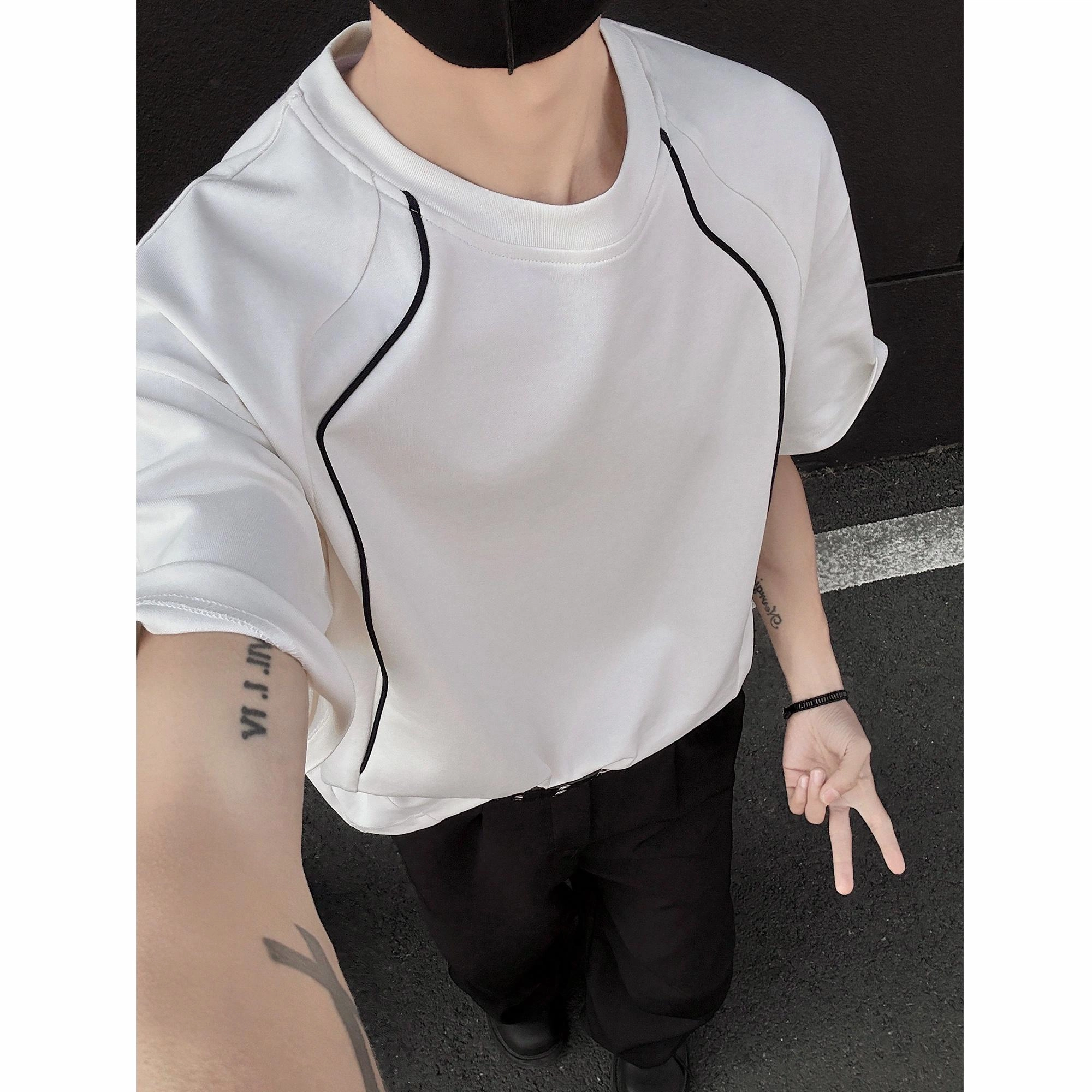 TOM ADAM T