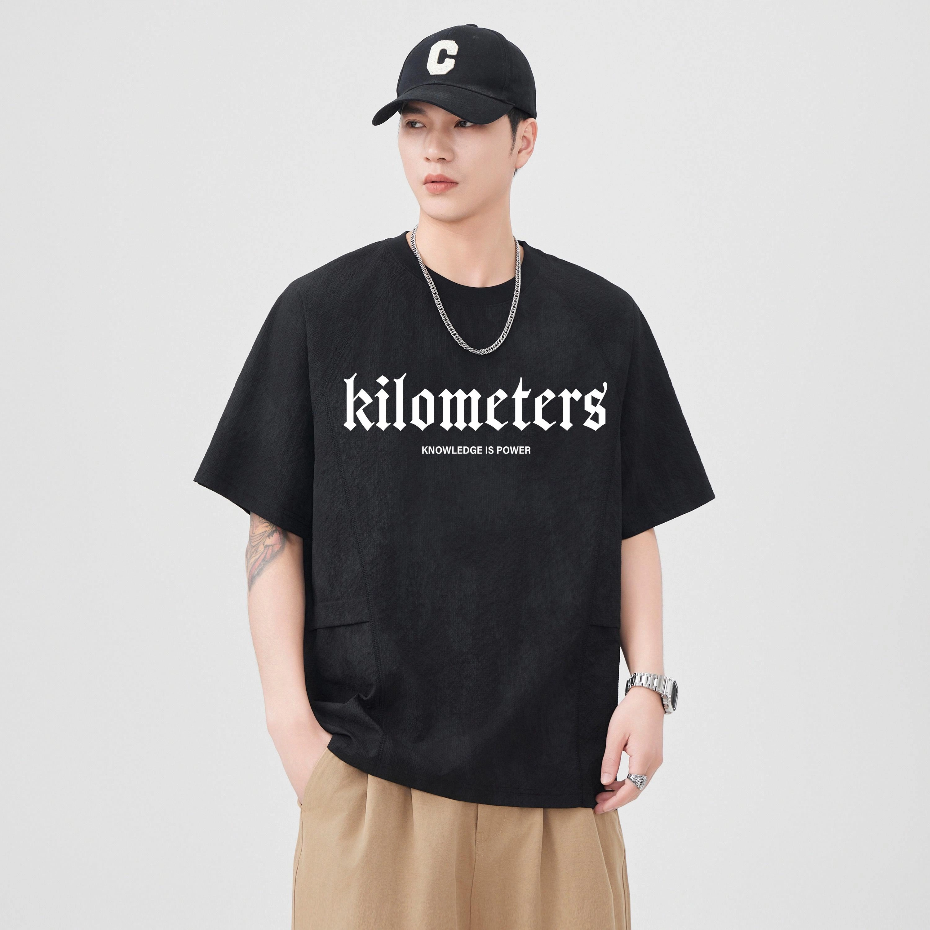 KM T