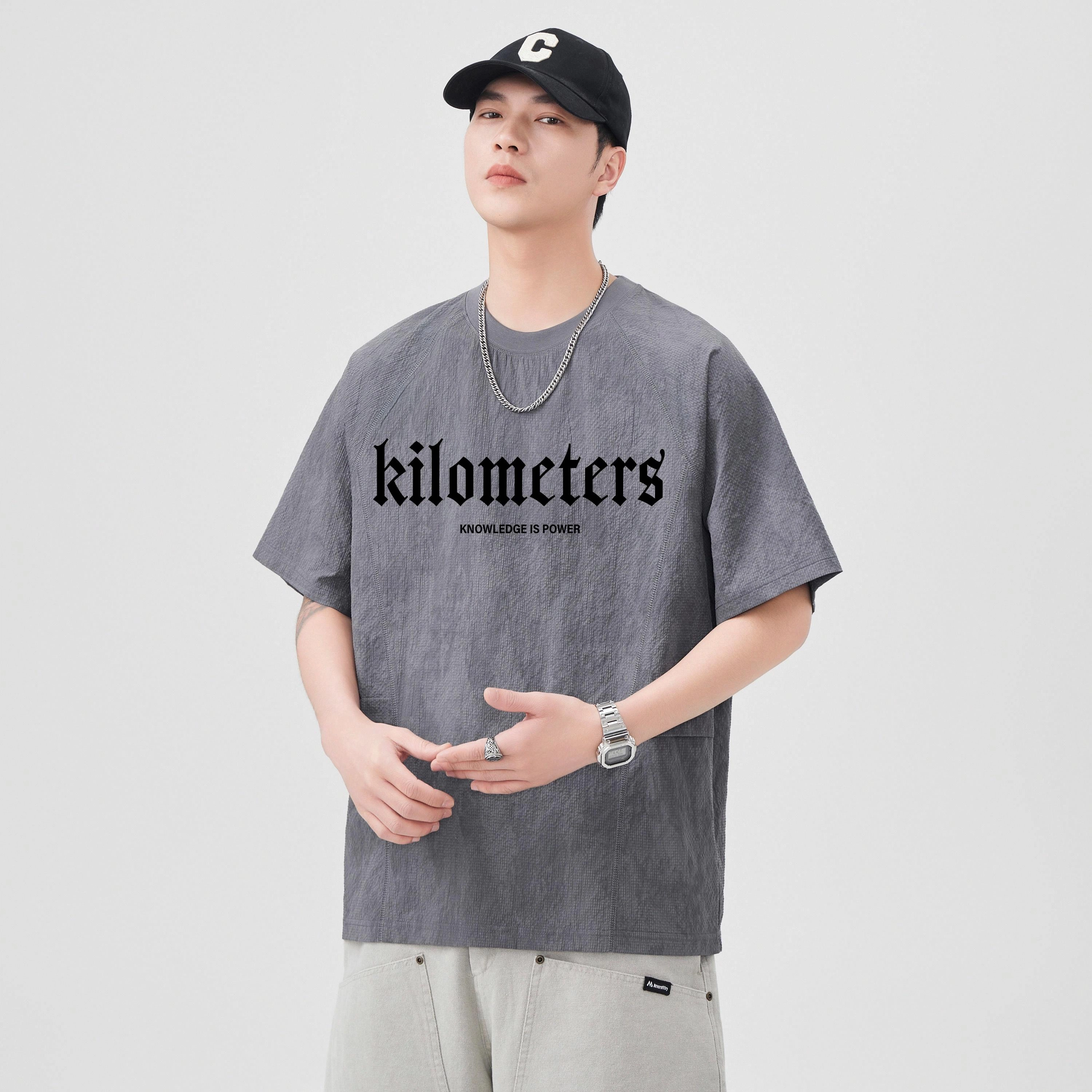 KM T