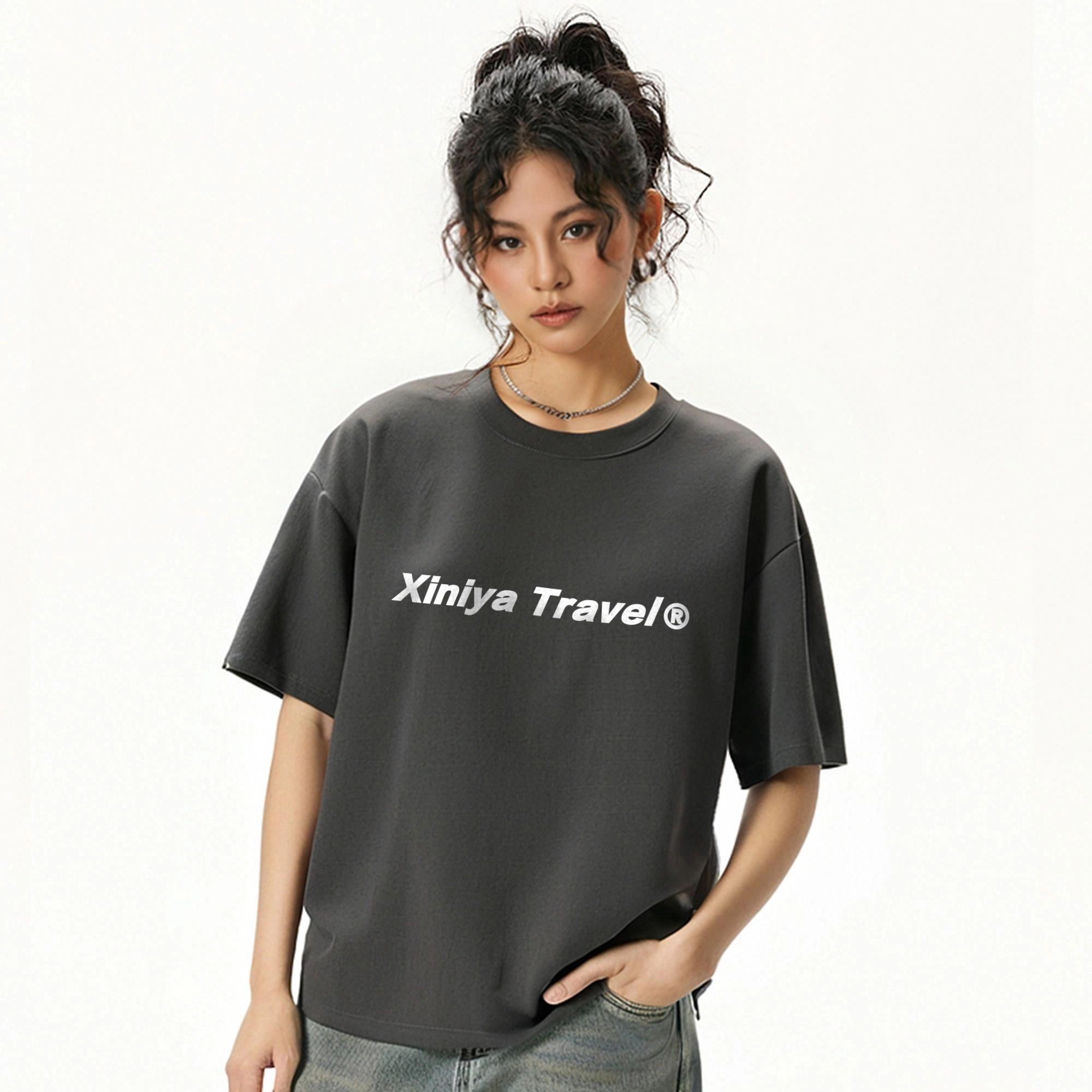 XINIYA TRAVEL LOGOT