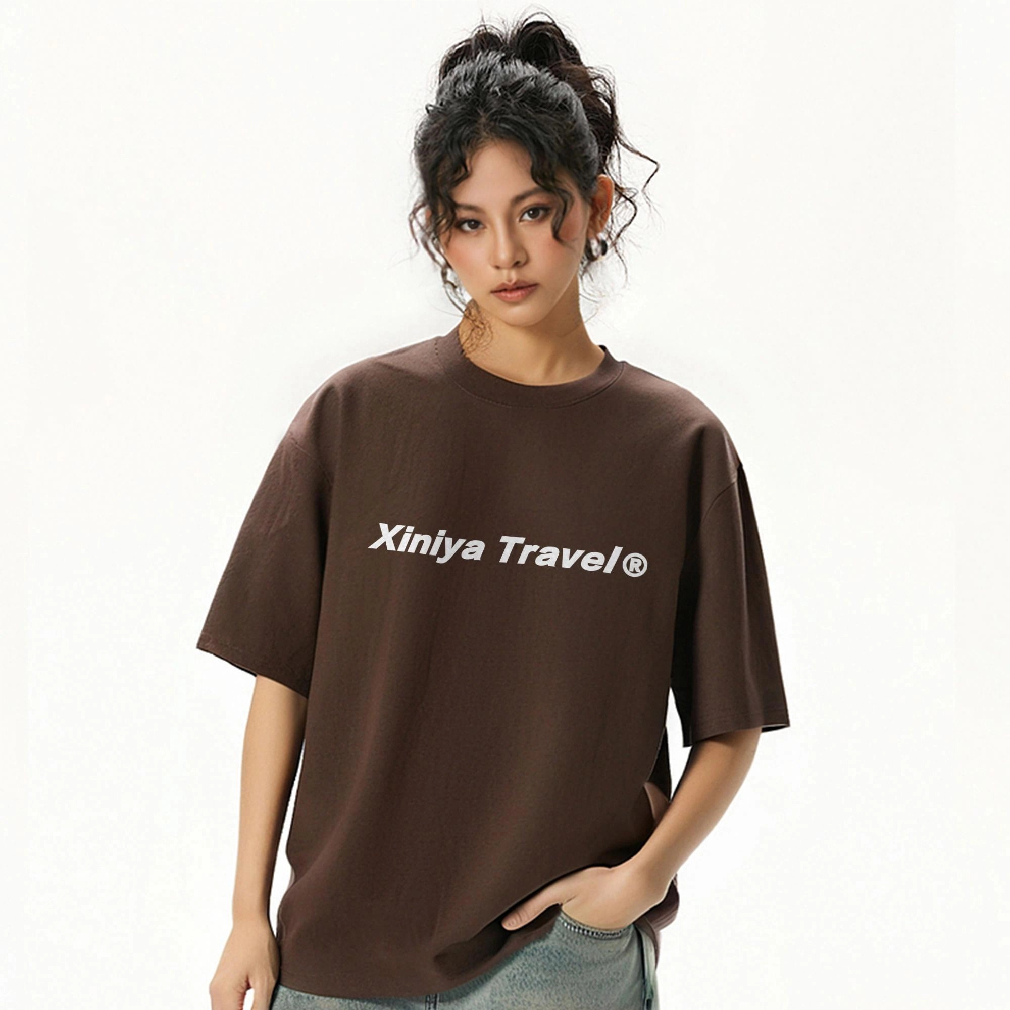 XINIYA TRAVEL LOGOT