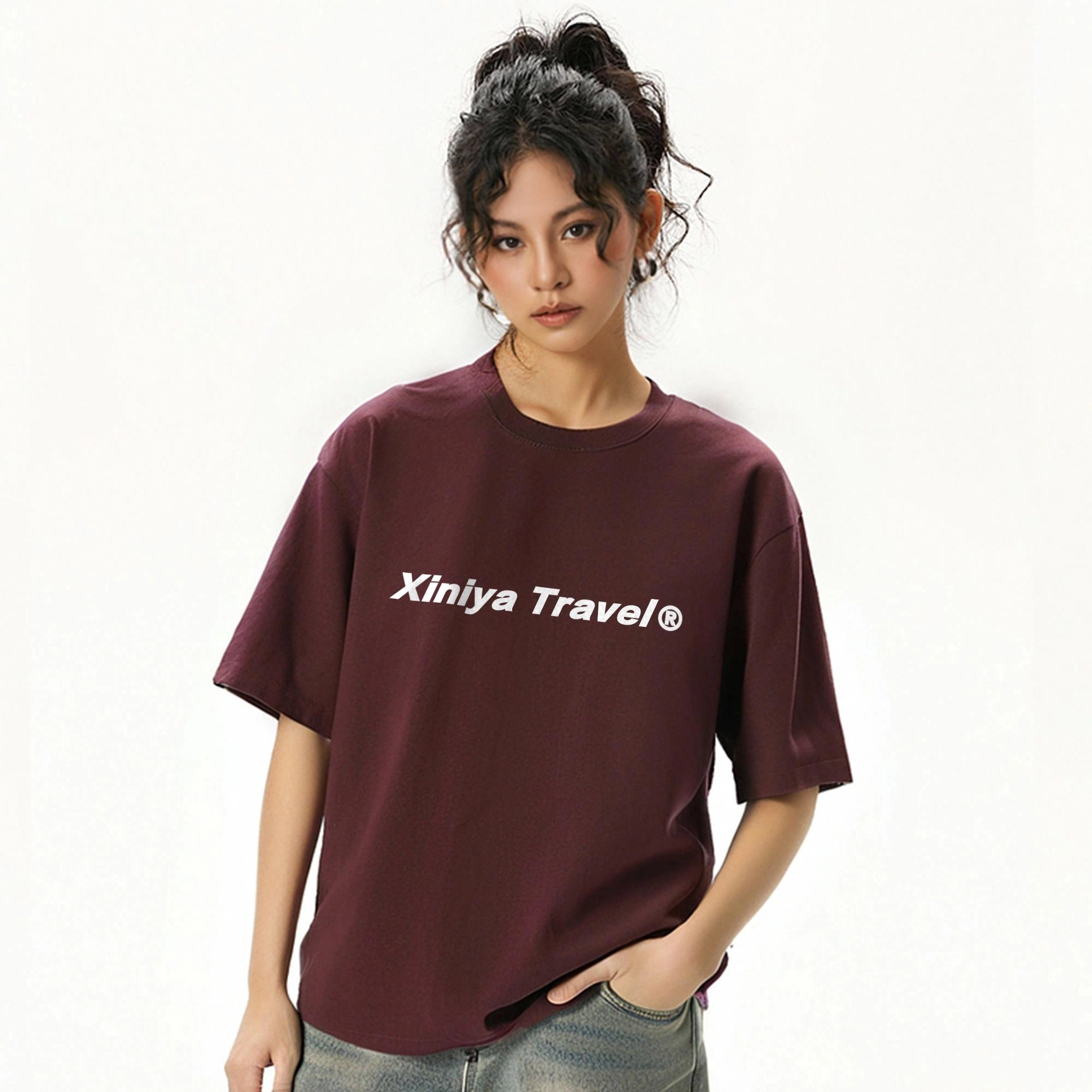 XINIYA TRAVEL LOGOT
