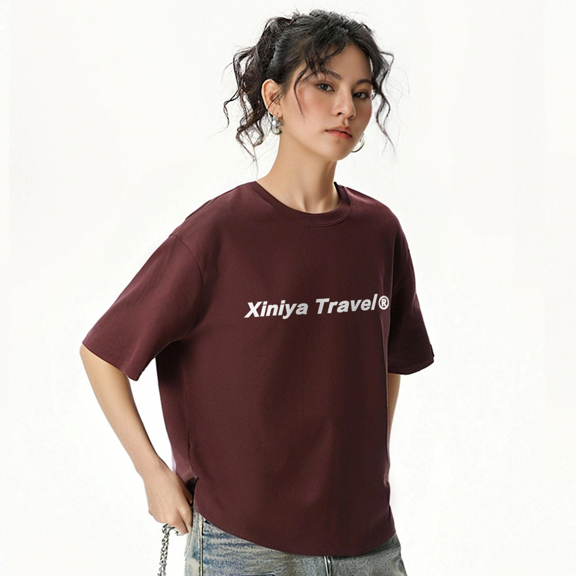 XINIYA TRAVEL LOGOT