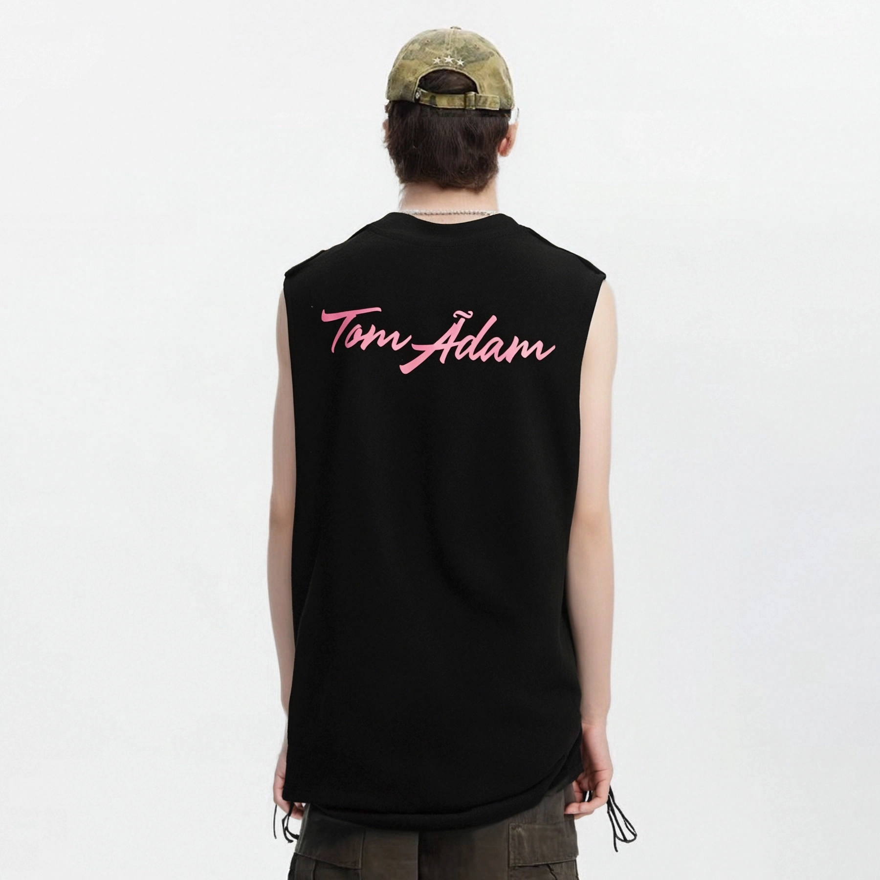 TOM ADAM