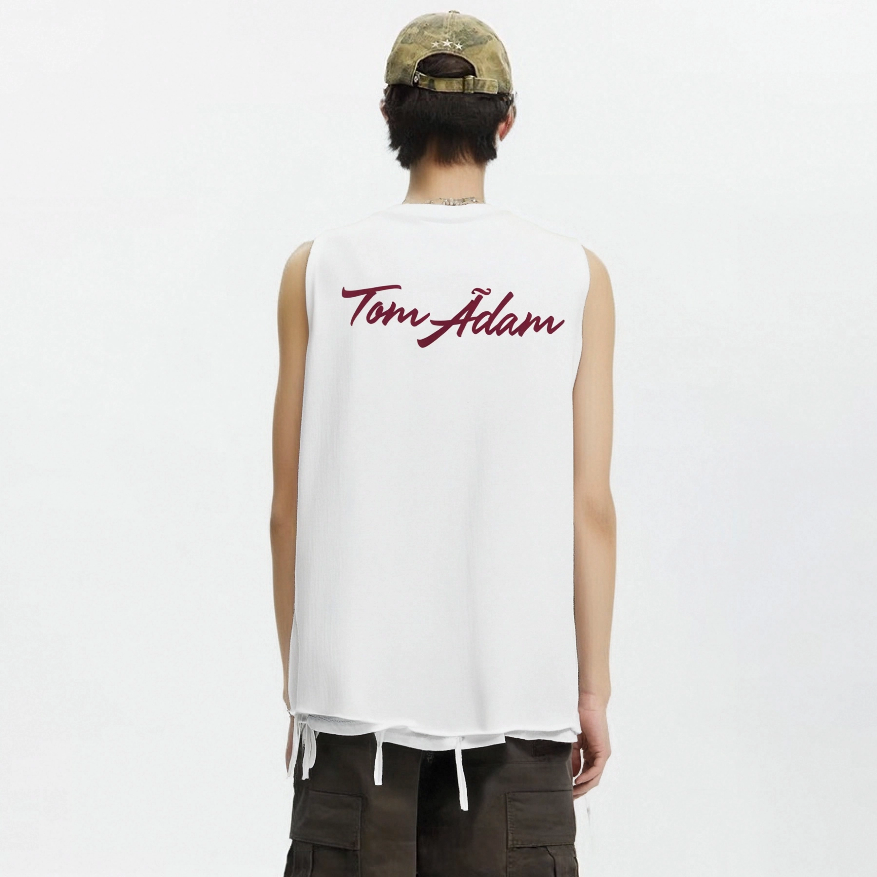 TOM ADAM
