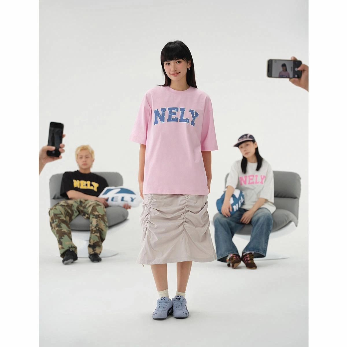 NELY logoT