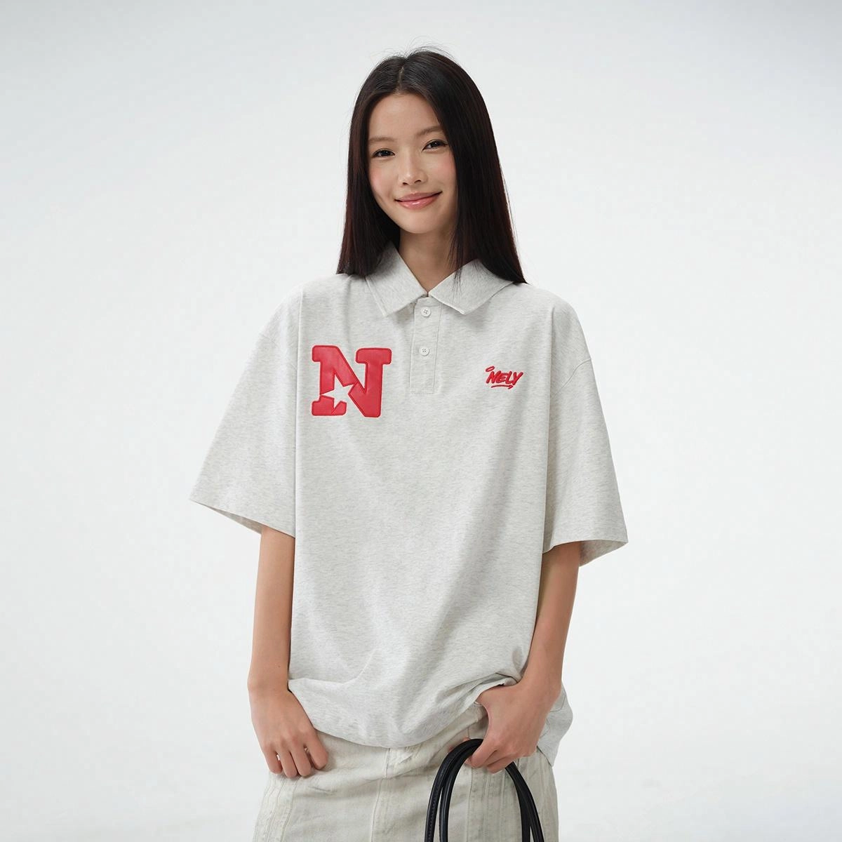 NELY T