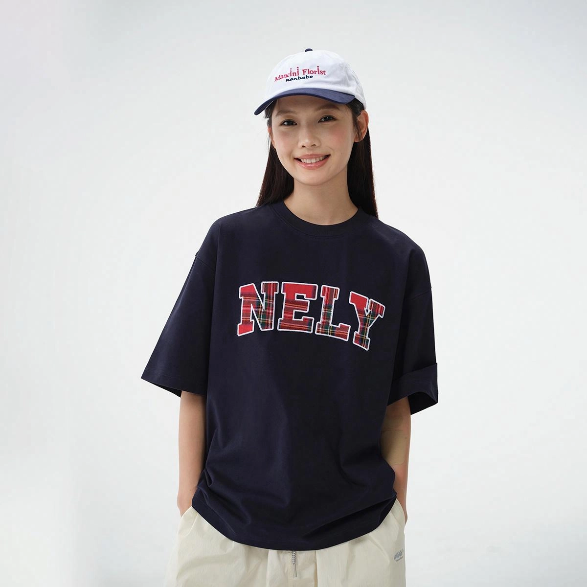 NELY T