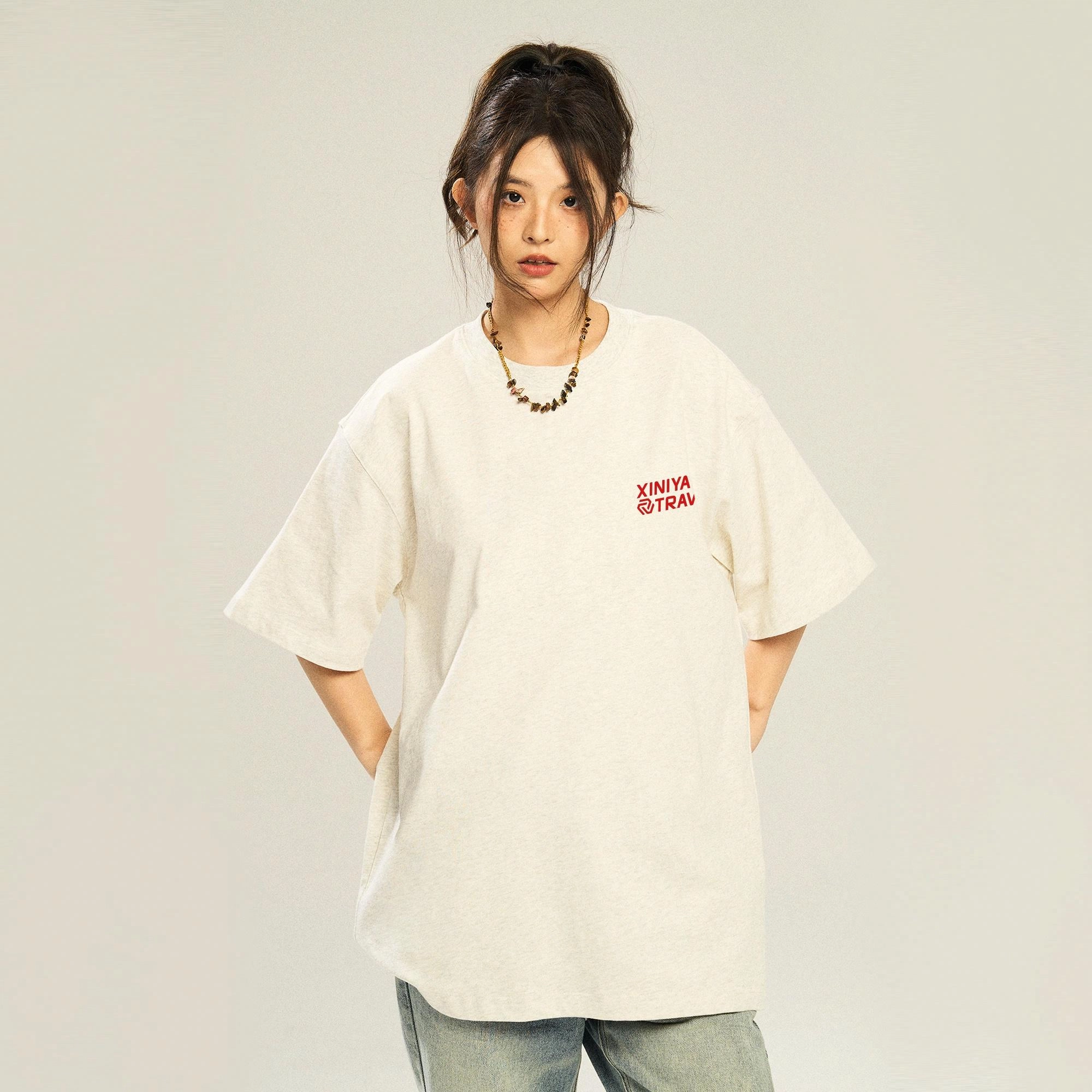 XINIYA TRAVEL LOGOT