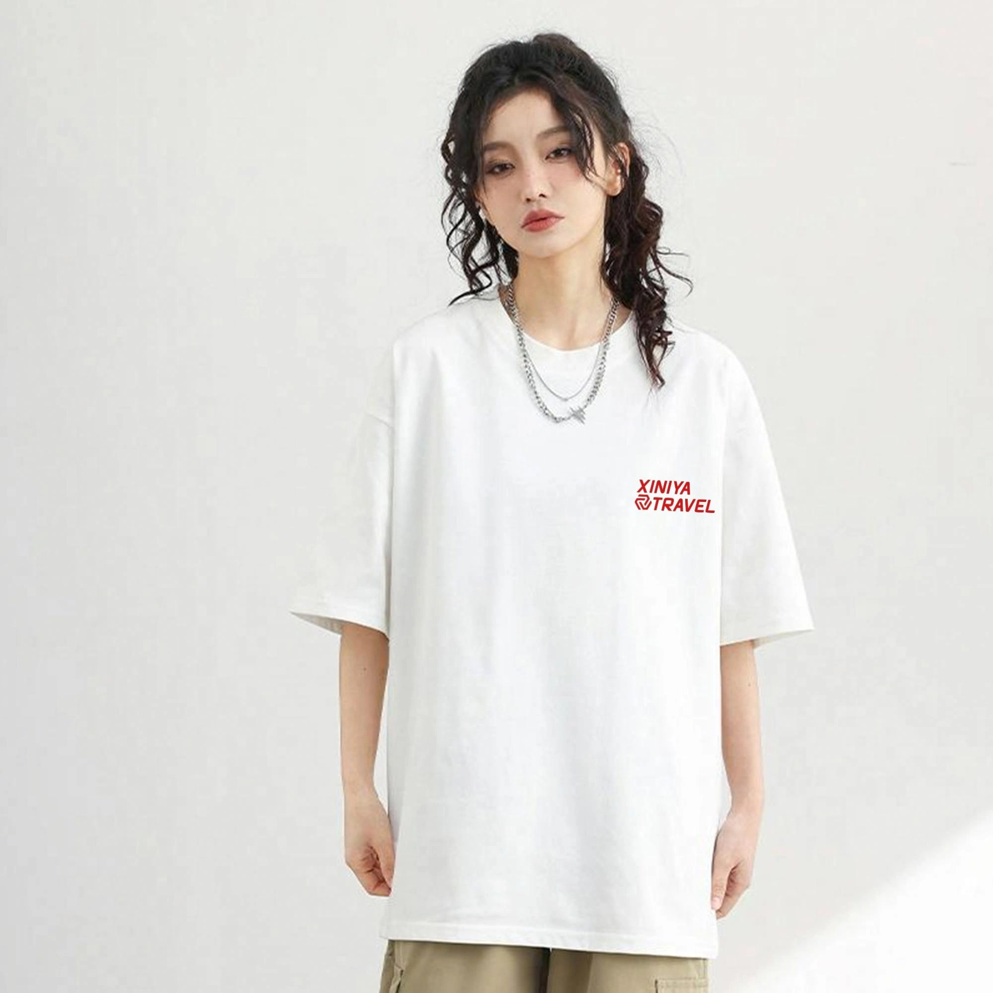 XINIYA TRAVEL LOGOT