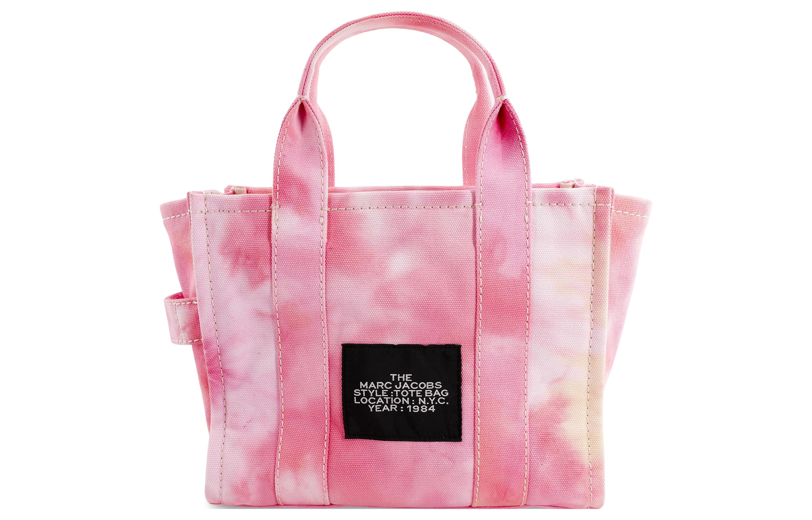 MARC JACOBS MJ The Traveler logo