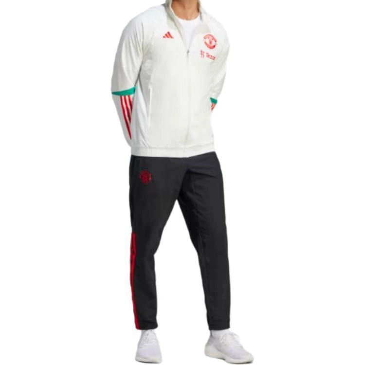 adidas MANCHESTER UNITED TIRO 23 PRESENTATION JACKET logo