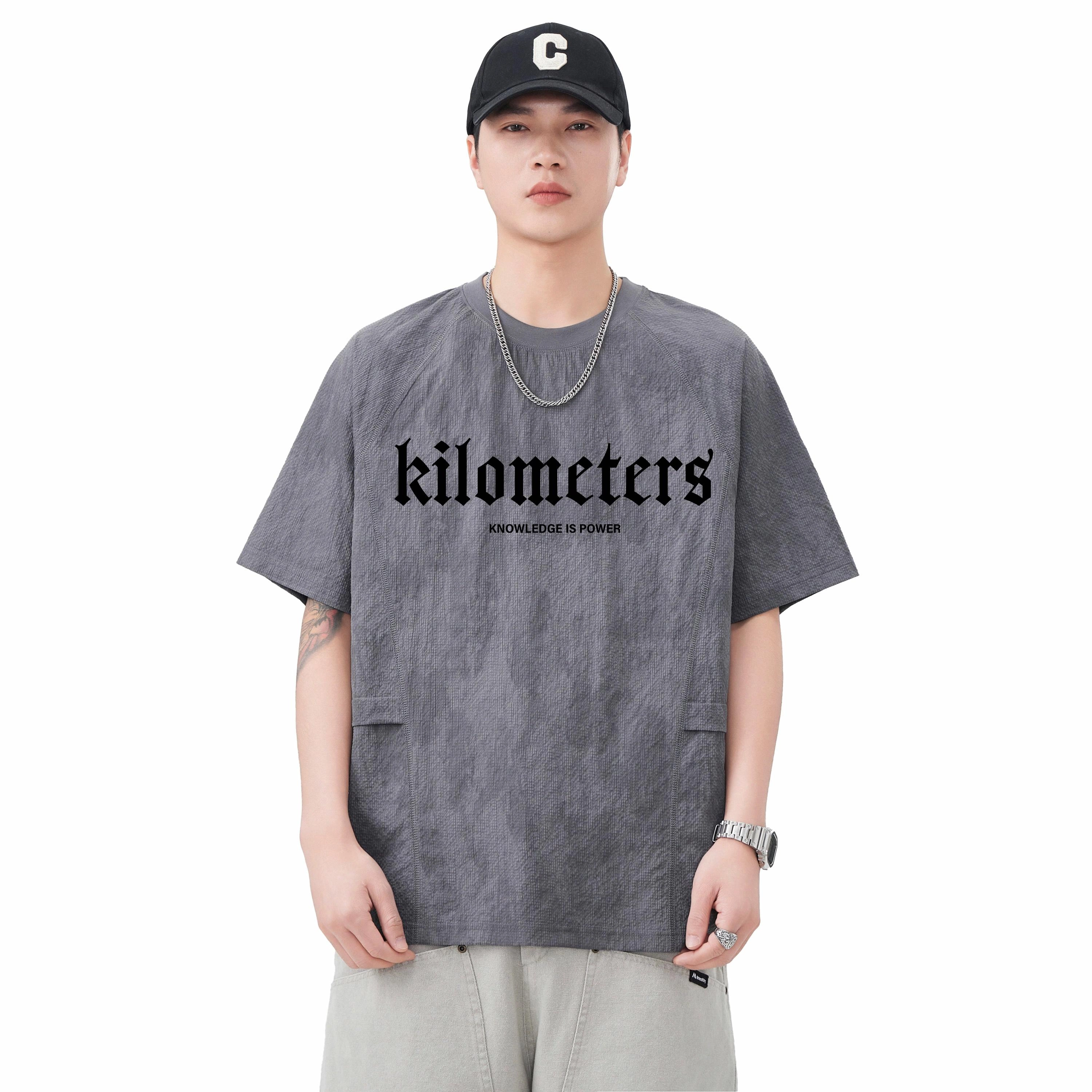 KM T