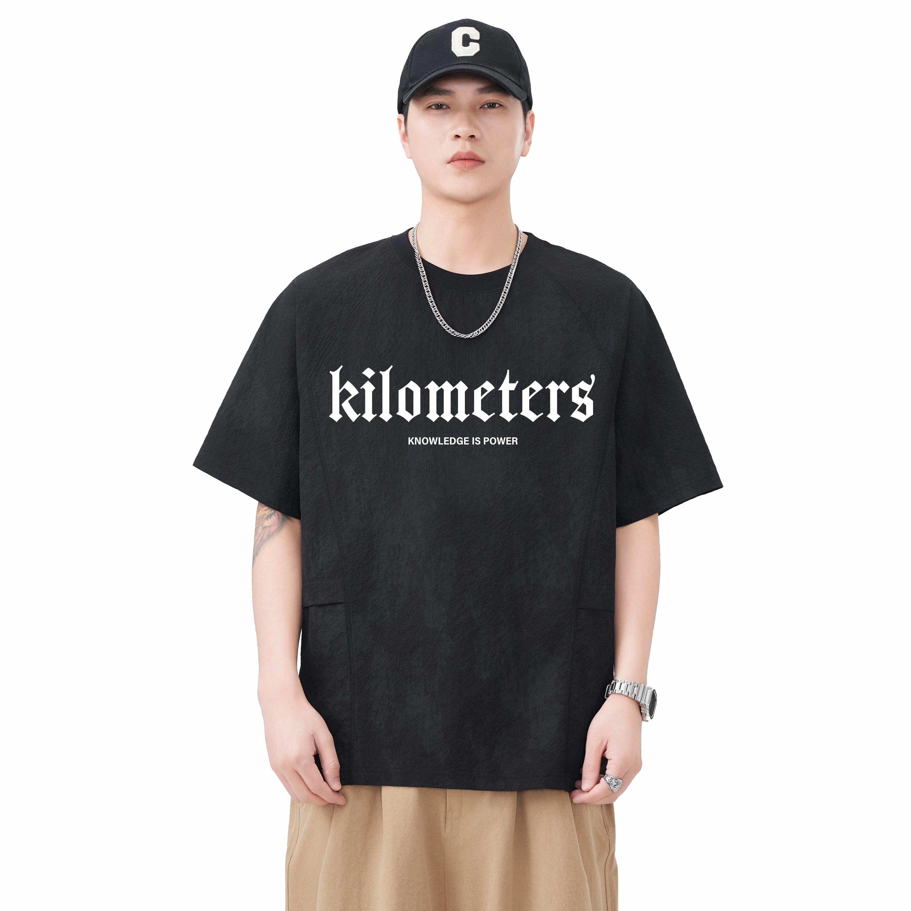 KM T