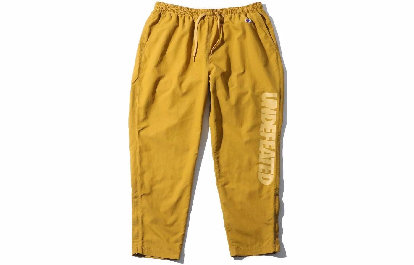 UNDEFEATED x Champion Logo