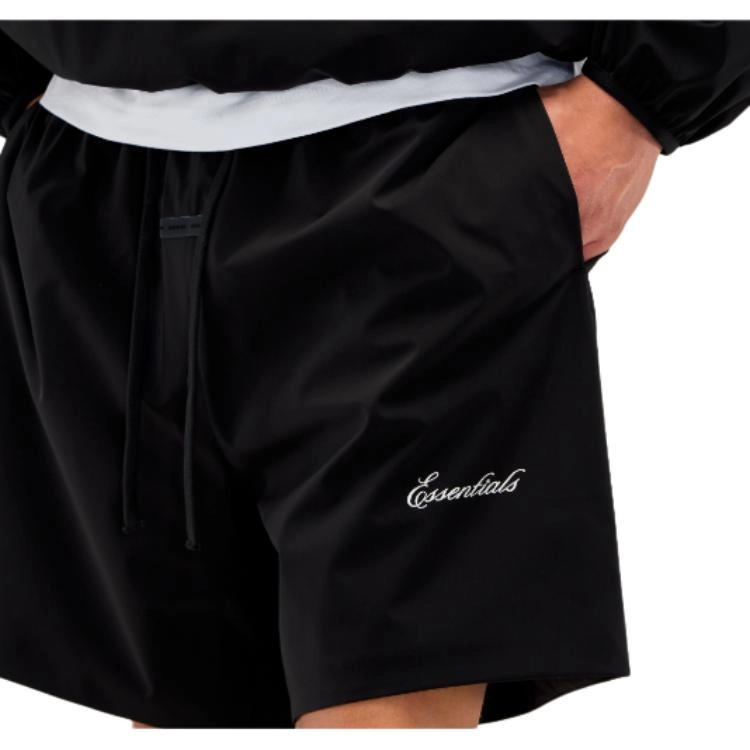Fear of God Essentials SS25 25 PRING DROP1 SPORTY NYLON SOCCER SHORT JET BLACK ESSENTIALS FEAR OF GOD