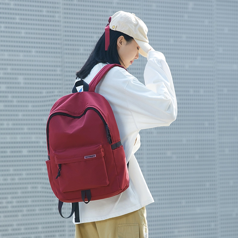木村耀司潮流百搭大容量大学生通勤休闲运动多口袋牛津纺电脑包旅行包书背包双肩包大号男女同款情侣款 米白色/黑色/ 酒红色