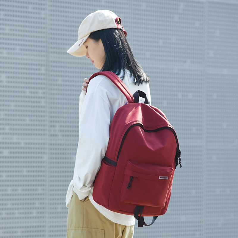 木村耀司潮流百搭大容量大学生通勤休闲运动多口袋牛津纺电脑包旅行包书背包双肩包大号男女同款情侣款 米白色/黑色/ 酒红色
