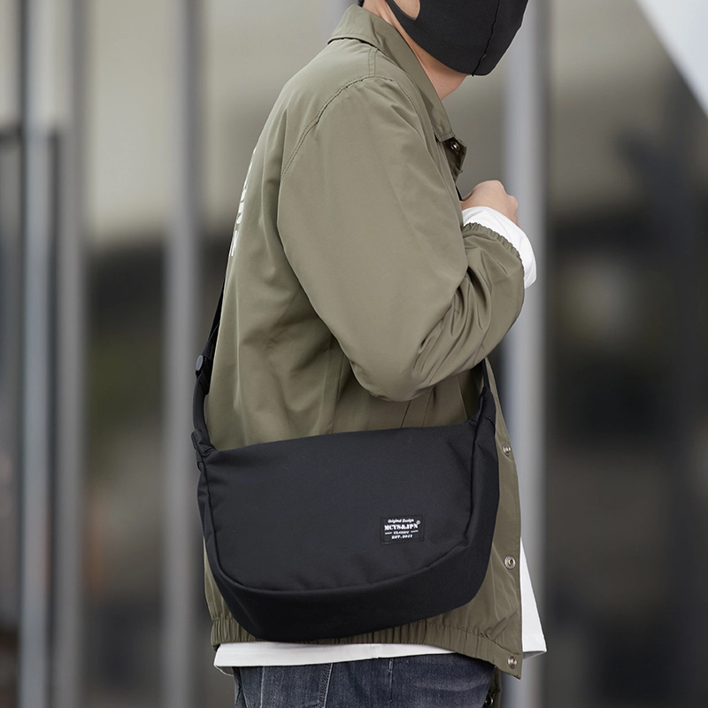 木村耀司 街头潮流休闲运动小众设计百搭通勤 拉链开合 牛津纺 腰包腋下包胸包饺子包斜挎包 男女同款情侣款 黑色 常规