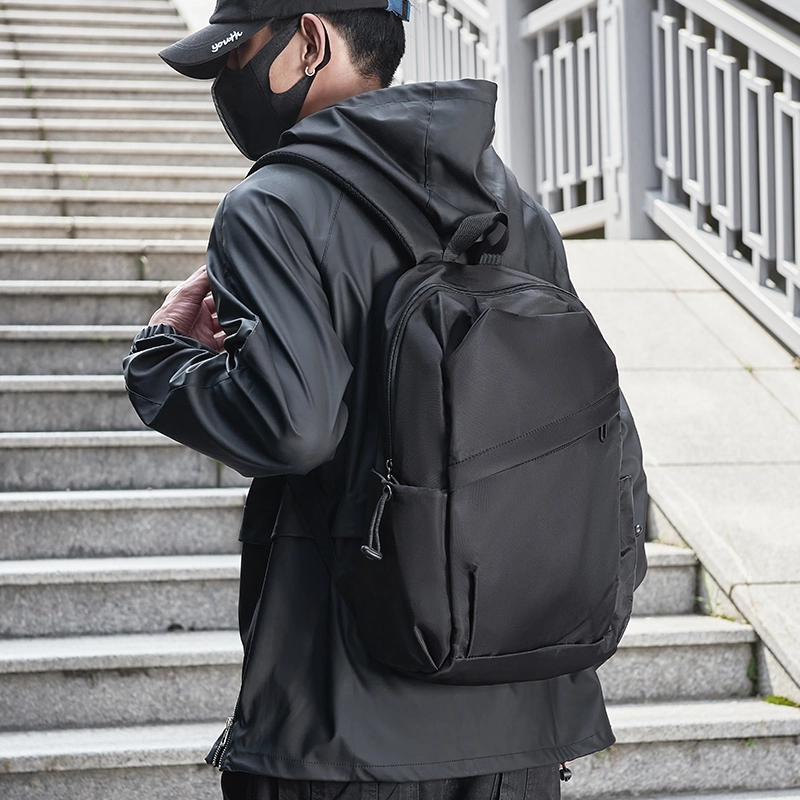 木村耀司 潮流百搭大容量大学生通勤休闲运动多口袋 牛津纺 电脑包旅行包书背包双肩包 常规 男女同款情侣款 黑色/迷彩黑