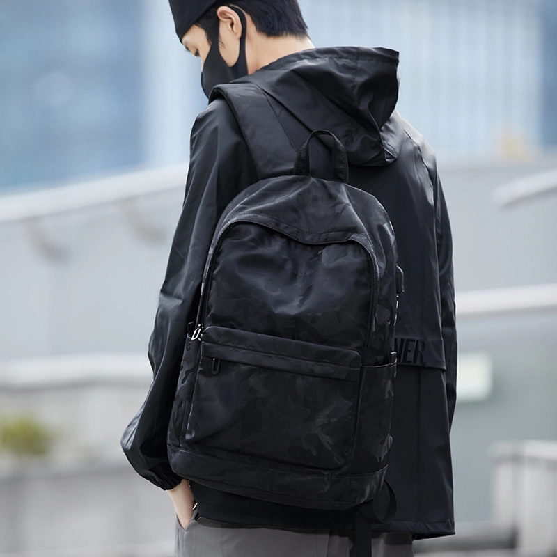 木村耀司 潮流百搭大容量大学生通勤休闲运动多口袋 涤纶 电脑包旅行包书背包双肩包 常规 男女同款情侣款 黑色/迷彩黑