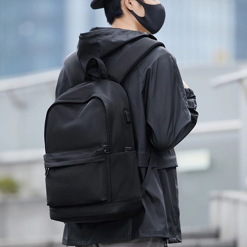 木村耀司 潮流百搭大容量大学生通勤休闲运动多口袋 涤纶 电脑包旅行包书背包双肩包 常规 男女同款情侣款 黑色/迷彩黑