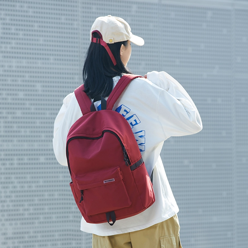 木村耀司潮流百搭大容量大学生通勤休闲运动多口袋牛津纺电脑包旅行包书背包双肩包大号男女同款情侣款 米白色/黑色/ 酒红色