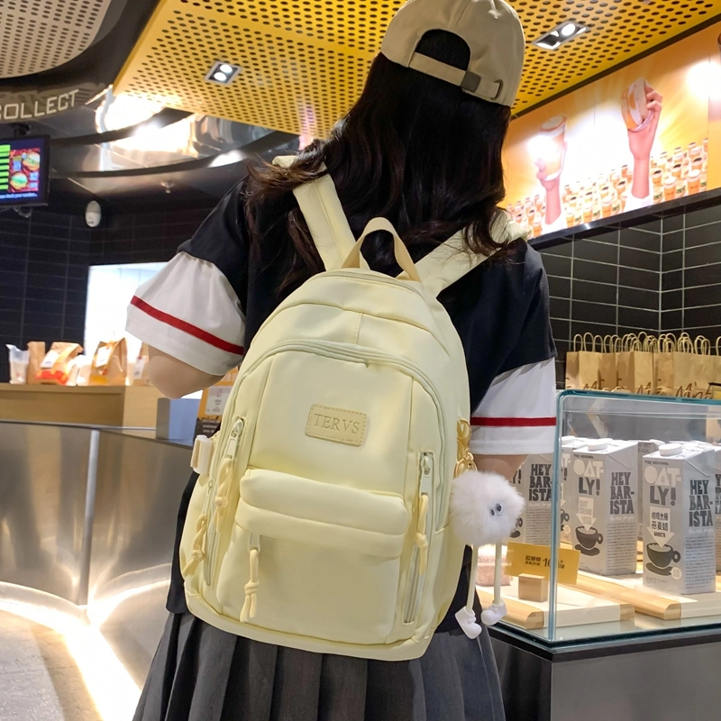 醇龙  尼龙男女通用多色书包大容量学生轻便减负护脊高颜值背包纯色多口袋双肩包