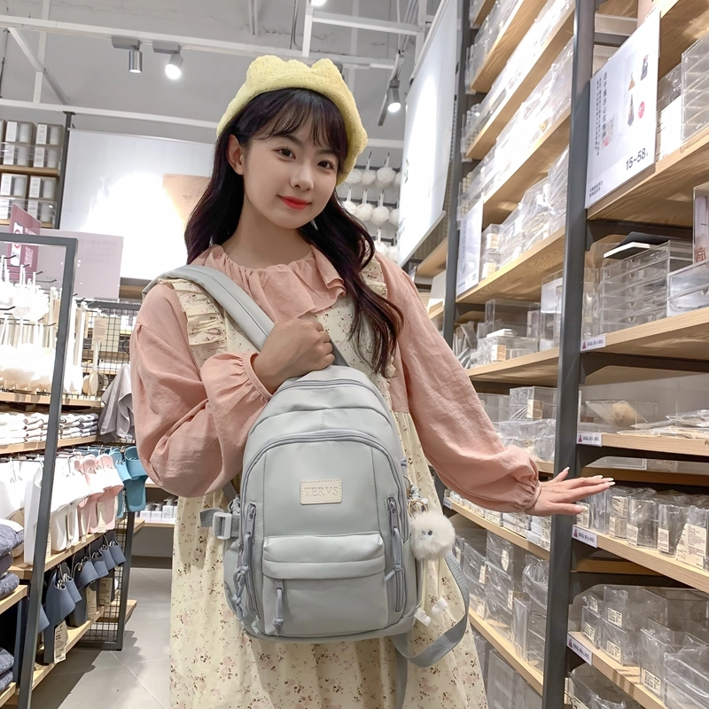 醇龙  尼龙男女通用多色书包大容量学生轻便减负护脊高颜值背包纯色多口袋双肩包