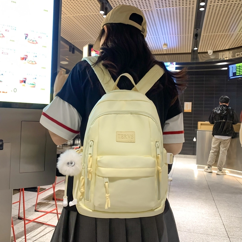 醇龙  尼龙男女通用多色书包大容量学生轻便减负护脊高颜值背包纯色多口袋双肩包
