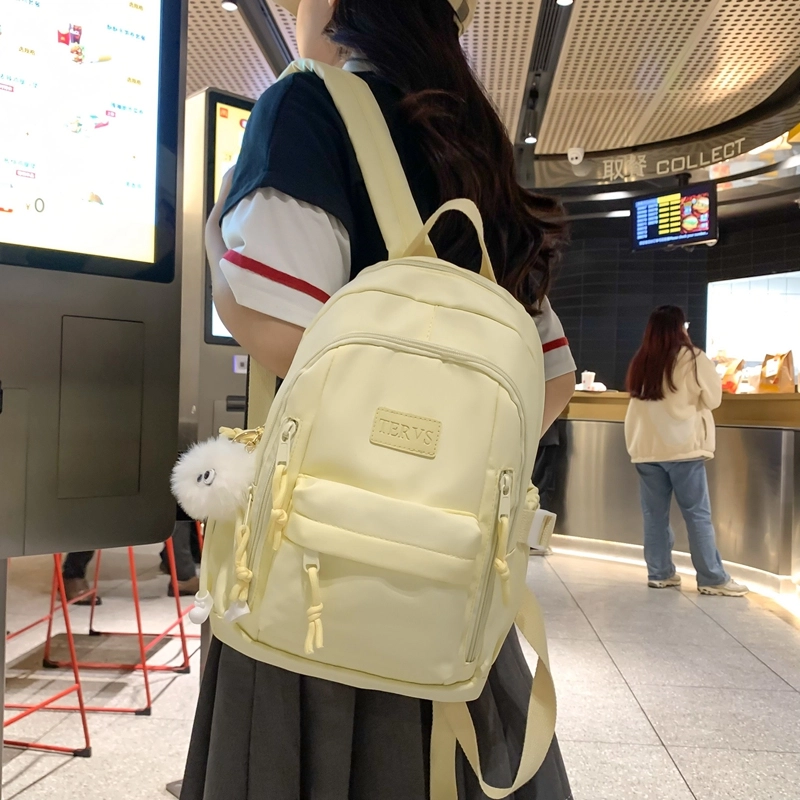 醇龙  尼龙男女通用多色书包大容量学生轻便减负护脊高颜值背包纯色多口袋双肩包