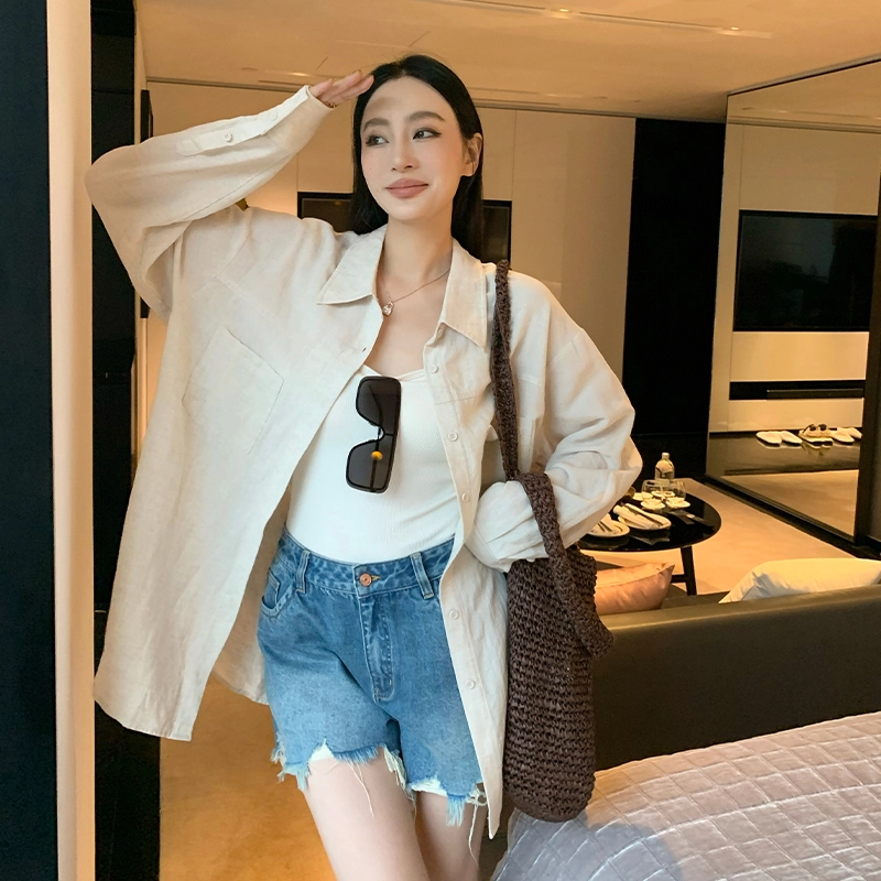 周淼 纯色纽扣长袖衬衫 女款
