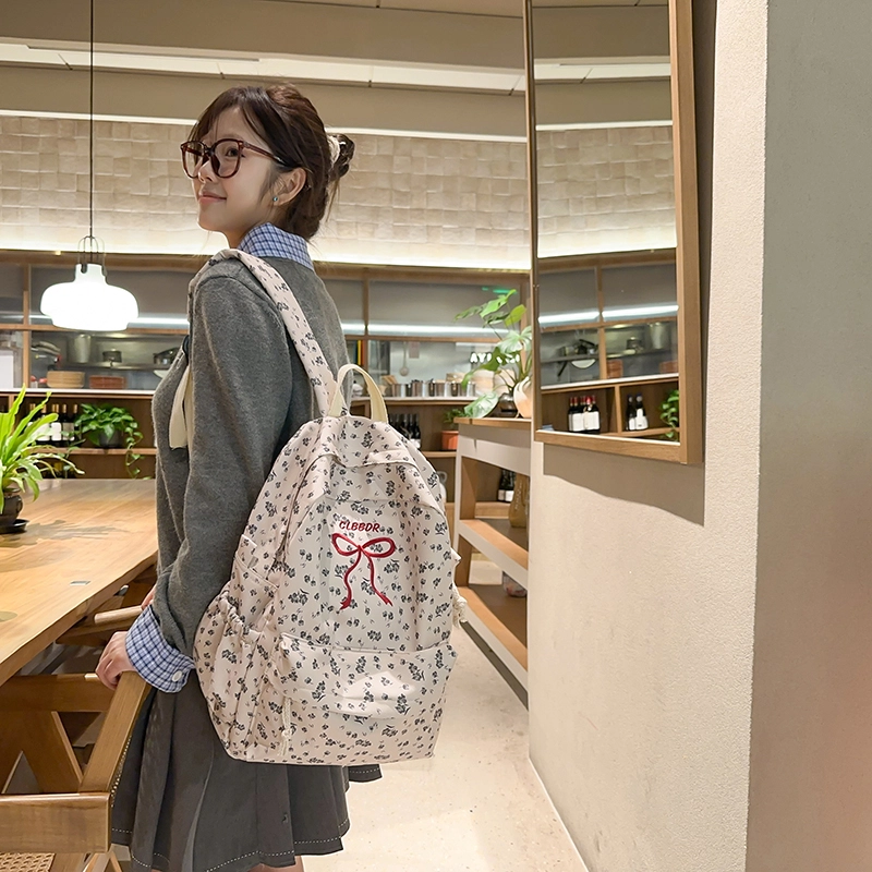 笛贝嘉 日系森系甜美蝴蝶结小花 尼龙 双肩包 女款 多色