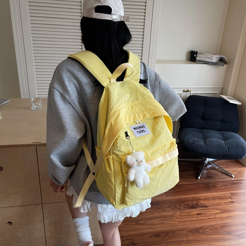 笛贝嘉 复古简约轻便防水上课通勤 布 双肩包 男女同款情侣款 多色