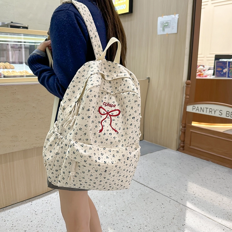 笛贝嘉 日系森系甜美蝴蝶结小花 尼龙 双肩包 女款 多色