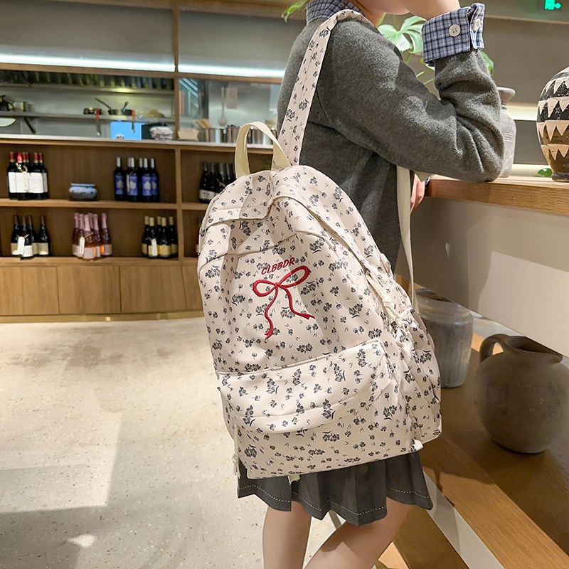 笛贝嘉 日系森系甜美蝴蝶结小花 尼龙 双肩包 女款 多色