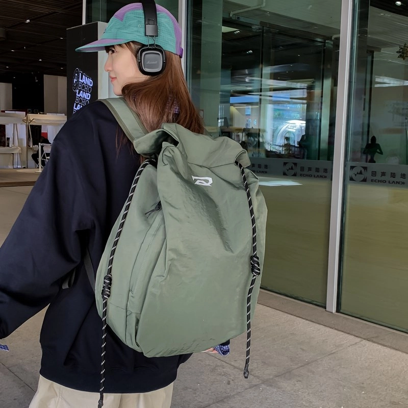 笛贝嘉 韩版简约大容量旅游背包抽绳纯色休闲运动学生书包 复合布 双肩包 男女同款情侣款 多色