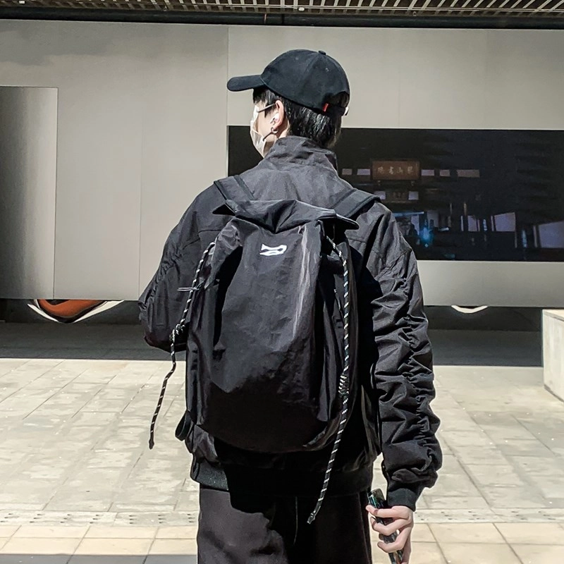 笛贝嘉 韩版简约大容量旅游背包抽绳纯色休闲运动学生书包 复合布 双肩包 男女同款情侣款 多色