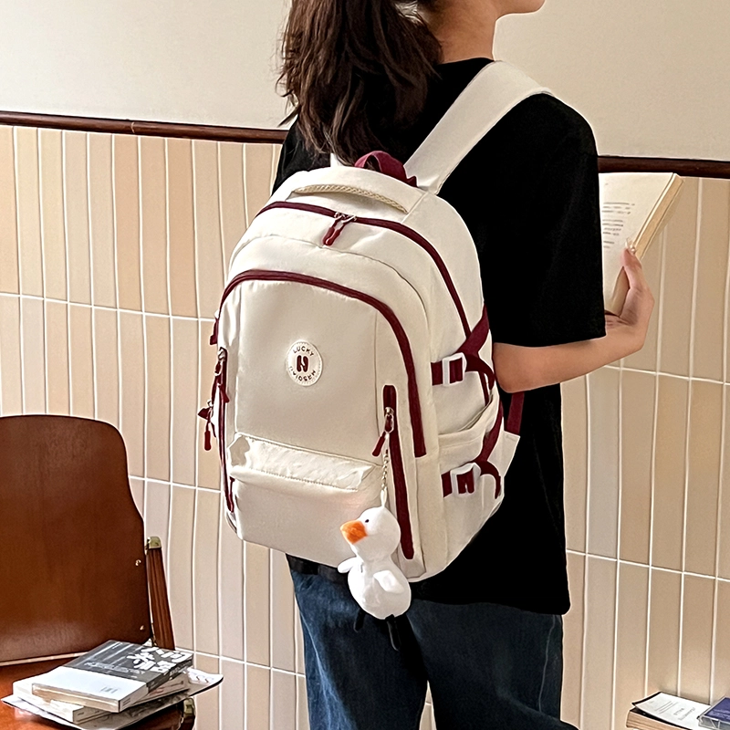 纳兰杜 大容量潮流运动轻便通勤百搭高中生高颜值学生 织物 电脑包旅行包双肩包背包书包 男女同款情侣款 灰色/子夜黑/橘配