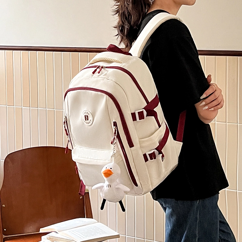 纳兰杜 大容量潮流运动轻便通勤百搭高中生高颜值学生 织物 电脑包旅行包双肩包背包书包 男女同款情侣款 灰色/子夜黑/橘配