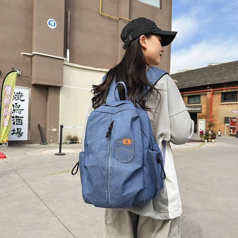 泰迪珍藏 复古轻便旅行通勤 牛仔拼网 双肩包 男女同款情侣款 蓝色/黑色