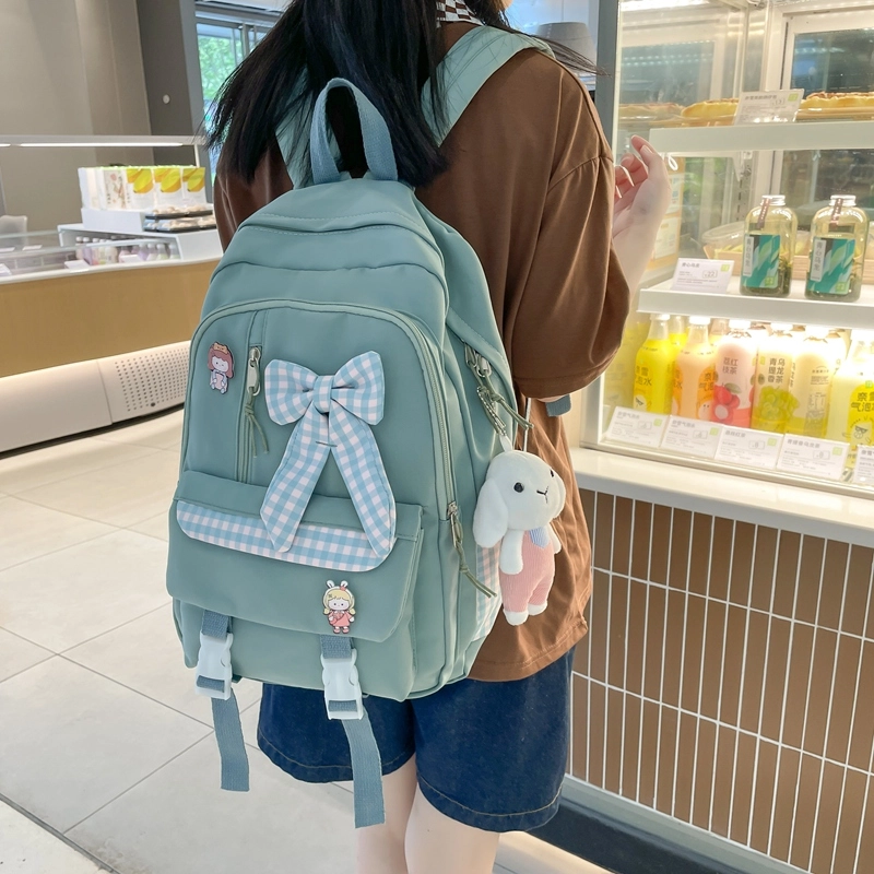 尼格尔 小学生书包蝴蝶结可爱甜美尼龙书包背包双肩包 女款 多色