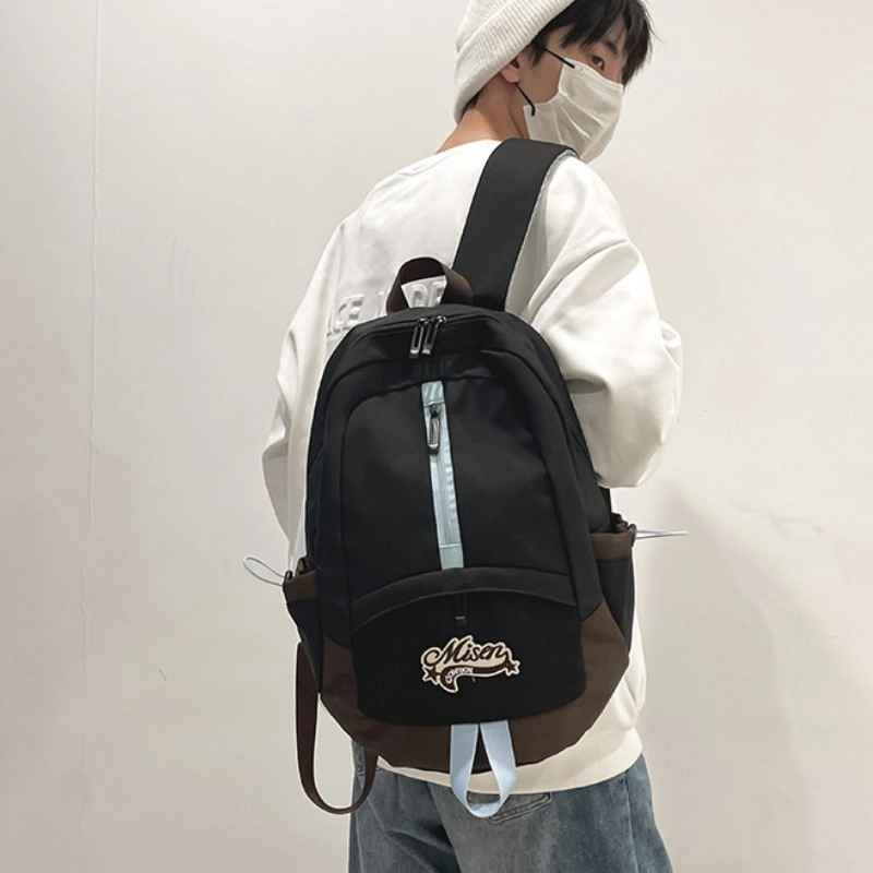 爱尔绅特 轻便休闲大容量潮流时尚小众设计 尼龙 双肩包 男女同款情侣款 白色黑色