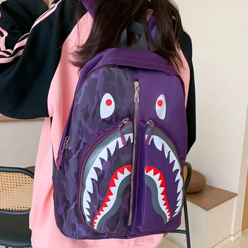 爱尔绅特 个性涂鸦鲨鱼学生休闲出行时尚潮流 尼龙 双肩包 男女同款情侣款 多色