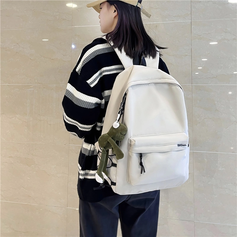 醇龙 耐脏简约书包大学生校园初中背包休闲旅行包 尼龙 双肩包 常规 男女同款情侣款 黑色/白色
