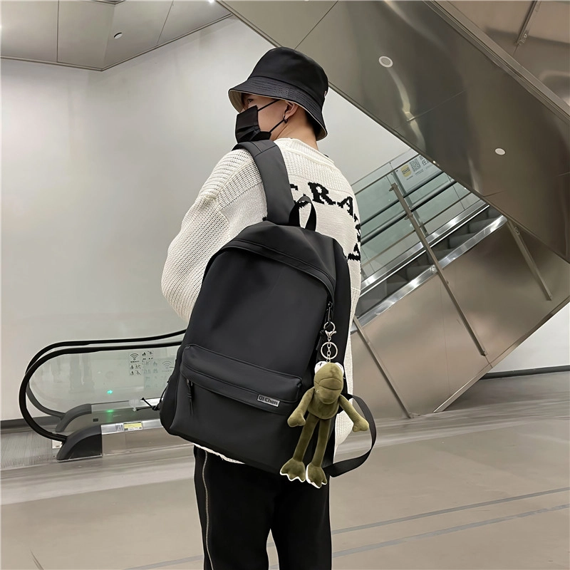 醇龙 耐脏简约书包大学生校园初中背包休闲旅行包 尼龙 双肩包 常规 男女同款情侣款 黑色/白色